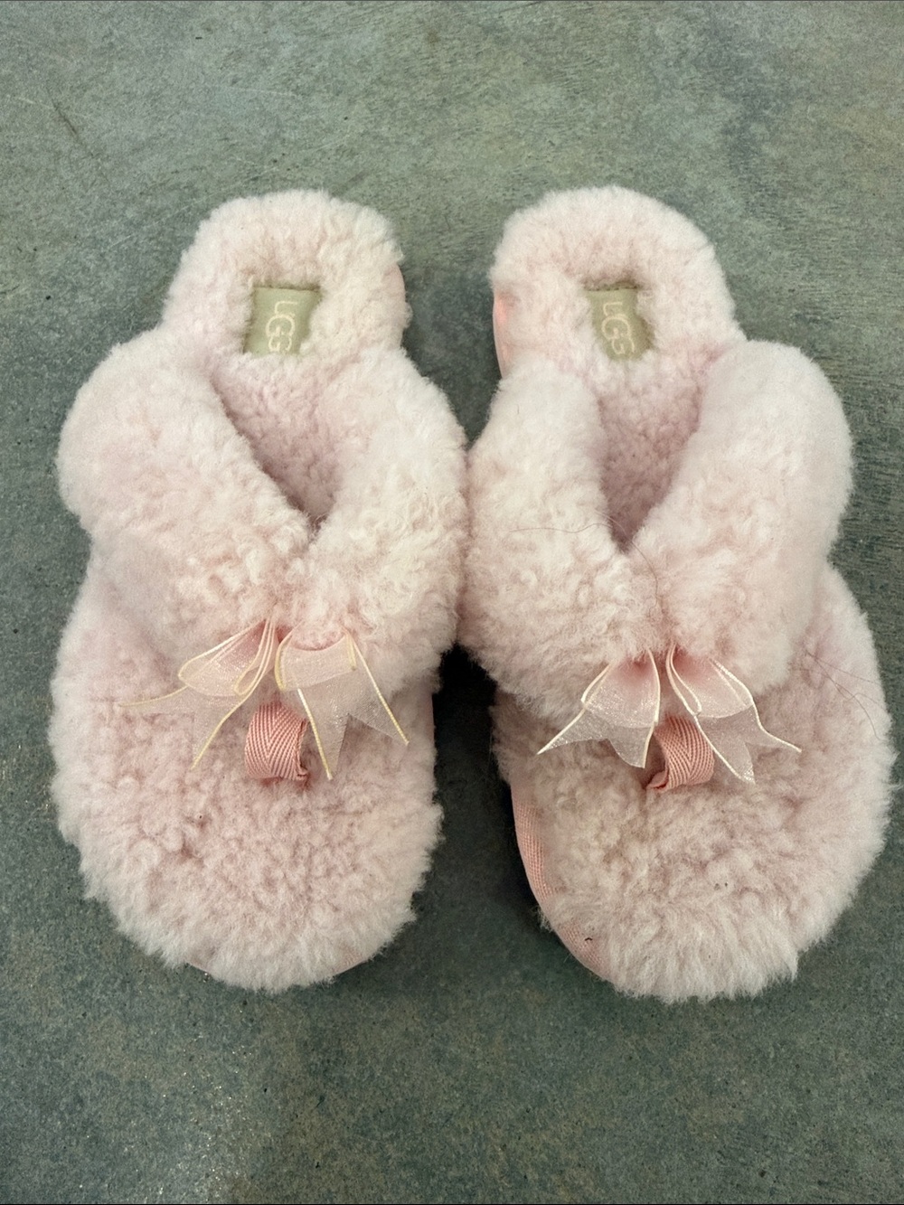 UGG Women's Blush Pink Fluffy Slide Slippers with Bow Accent